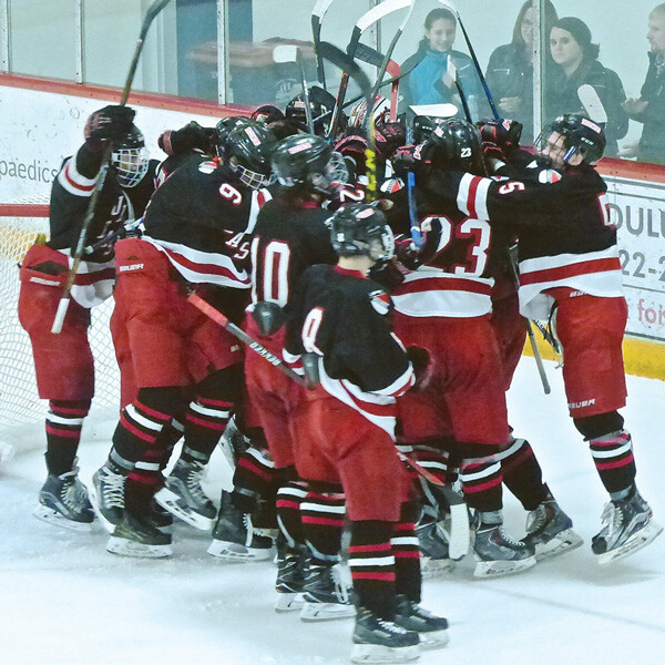 Indicating how sweet avenging last year's loss, inside a jam-packed Mars-Lakeview Arena, East's Greyhounds poured off the bench after their 4-1 victory. Photo credit: John Gilbert
