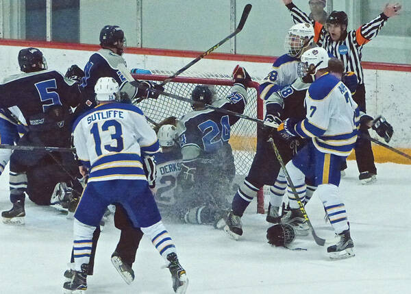 Ryan Eardley (24) and his Lawrence University teammates were sure they had taken a 2-1 lead over St. Scholastica, but the referee waved it off for being a millisecond after the second-period buzzer. Photo credit: John Gilbert
