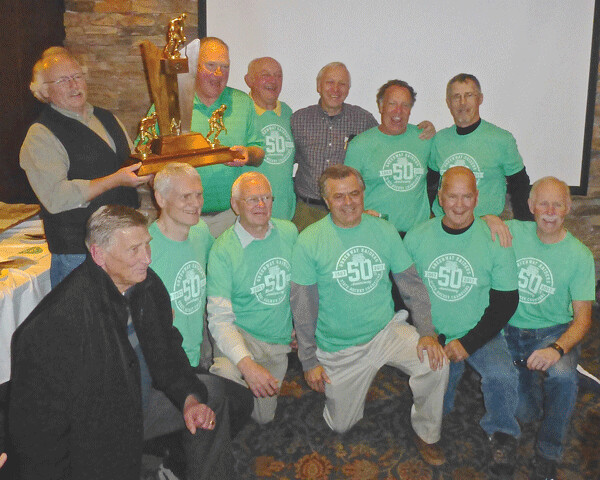 Members of the 1966-67 Greenway of Coleraine Raiders celebrated the 50th anniversary of their 1967 state hockey championship at this year’s tournament. Attending were, from left, front row Coach Bob Gernander, Gordy Holland, Paul Rygh, Jim MacNeil, Jim Stephens, Bill Joy; back row:  Mike Adams, Mike Barle (holding state trophy), George Delich, Jeff Kosak, Mick Metzer, and Mike Antonovich. Photo credit: John Gilbert