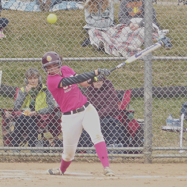 Adorned in UMD’s cancer-awareness pink jerseys, Becky Smith lined a sixth-inning hit to right field in the split with MSU-Mankato last Saturday. Photo credit: John Gilbert