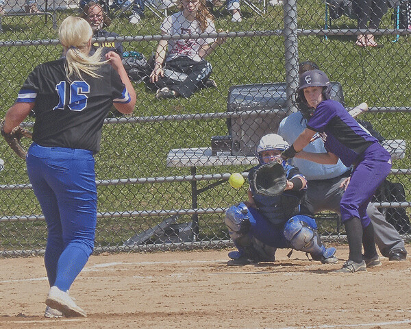 Chrisi Mizera windmilled through all but one inning as St. Scholastica won the UMAC softball tournament for the seventh time in nine years. Photo credit: John Gilbert