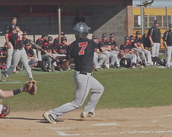 Jake Dubla singled to ignite a 2-out Duluth East rally for the clinching run of a 3-1 7AAAA victory over Grand Rapids. Dubla also doubled home two runs in the first inning. Photo credit: John Gilbert