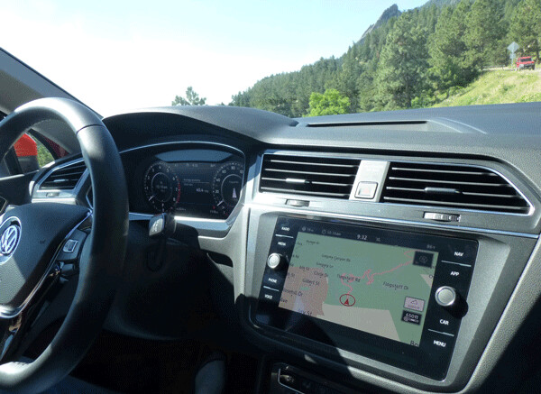 Clean, sweeping dashboard includes large navigation-information screen.  Photo credit: John Gilbert