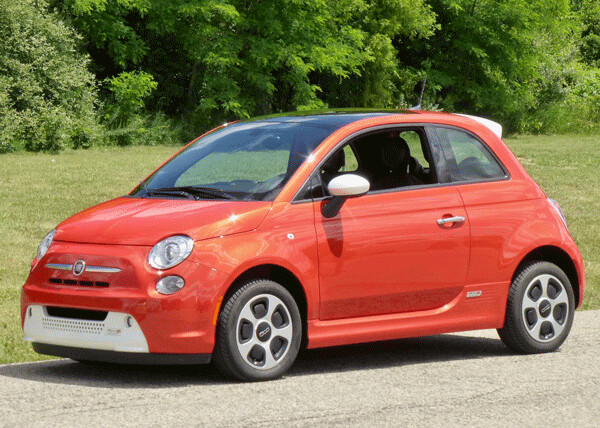 The tiny end of the spectrum is the Fiat 500e -- an incredible electric vehicle with impressive power and nearly 100-mile range between 4- hour charges. In, by the way, the brilliant Starfire Orange paint. Photo credit: John Gilbert