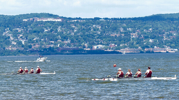 Duluth Mixed Masters Quad team comprised of (from bow) Jim Forsberg, Mary Miller, Cathy Ham and Bill Hodapp outran the quad of Bruce Deraub, Holly Anderson, Lorraine Turner and Eric Dott in a heat at the Duluth Rowing Regatta Saturday. Photo credit: John Gilbert