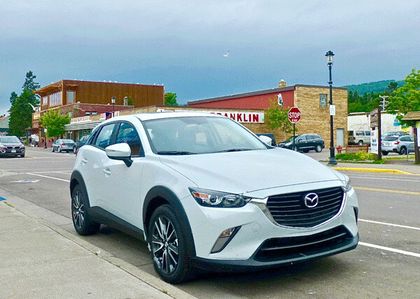 Foreboding skies above Grand Marais were no threat for the Mazda CX3, a hot-performing SUV despite compact size. Photo credit: John Gilbert
