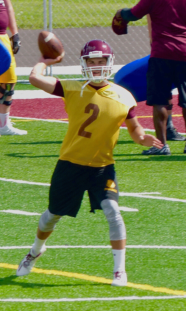 Sophomore Mike Rybarczyk prepared to deliver a pass during a UMD practice drill. Photo credit: john Gilbert