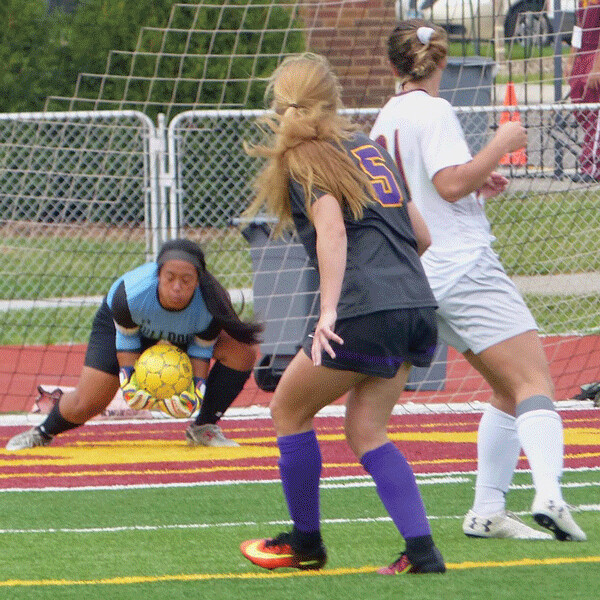Mankato’s Alesha Duccini blasted a shot, but UMD goalkeeper Sisley Ng was waiting to smother it in the Bulldogs 1-0 overtime loss last Saturday. Photo credit: John Gilbert