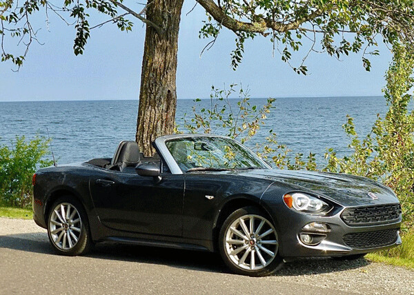 Fiat 124 Spider Roadster combines current technology with nostalgia from 50 years ago as an inexpensive open-air ride. Photo credit: John Gilbert