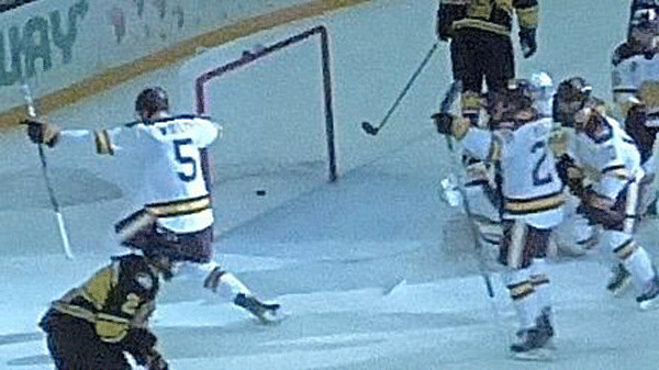 UMD sophomore defenseman Nick Wolff (5) moved in to score for a 2-0 UMD lead over Michigan Tech, although it didn't hold up in the Ice Breaker final. Photo credit: John Gilbert