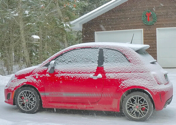 Hints of a White Christmas turn the Fiat 500 Abarth into an ornament. Photo credit: John Gilbert