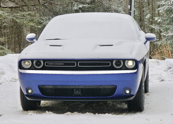 A crust of snow covered the Challenger GT, but remote start already had it warming up.  Photo credit: John Gilbert