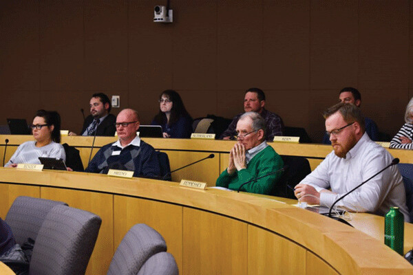 City councilors listening to speakers – Photo by Elizabeth McMahon