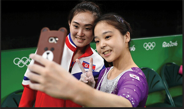 Lee Eun-Ju of South Korea (right) takes a selfie with Hong Un Jong of North Korea at the Rio Olympics in 2016. Dylan Martinez / Reuters