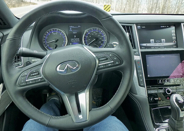 Cockpit view shows all Q60 controls and instruments focus driver's attention on driving. Photo credit: John Gilbert