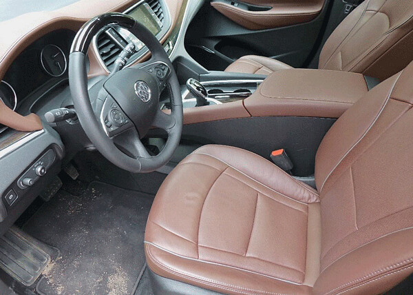 Rich leather and comfortable seats adorn TourX interior. Photo credit: John Gilbert