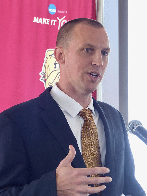 Justin Wieck addressed the Duluth media on Tuesday afternoon as he was introduced as UMD’s new basketball coach in a press conference at Malosky Stadium. Photo credit: John Gilbert