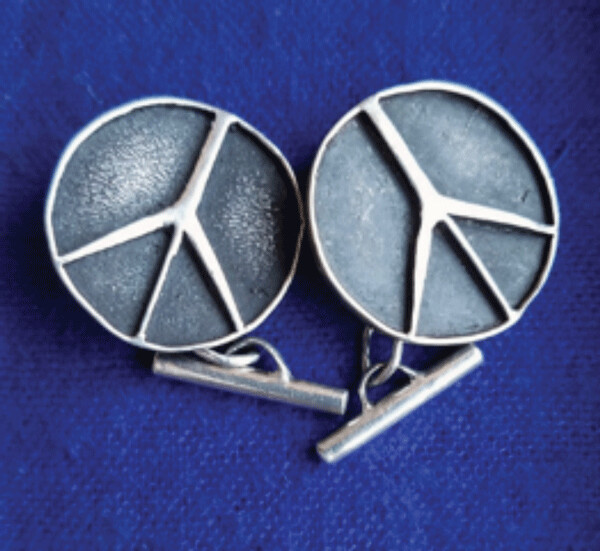 Peace Sign cuff links made by Harry Welty’s Uncle Frank, a Korean War Veteran.