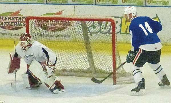  Hermantown star Drew LeBlanc set up next to ex-UMD goaltender Hunter Miska during the Blues 12-6 victory over the White in Monday’s Heritage Summer Classic. Photo credit: John Gilbert