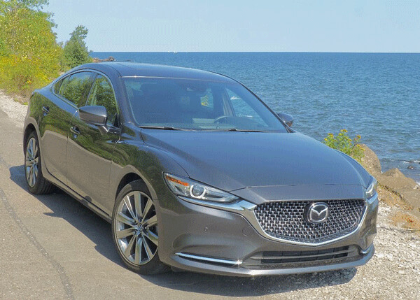 Mazda6 styling has become iconic among midsize cars, and 2018 adds turbocharged punch. Photo credit: John Gilbert