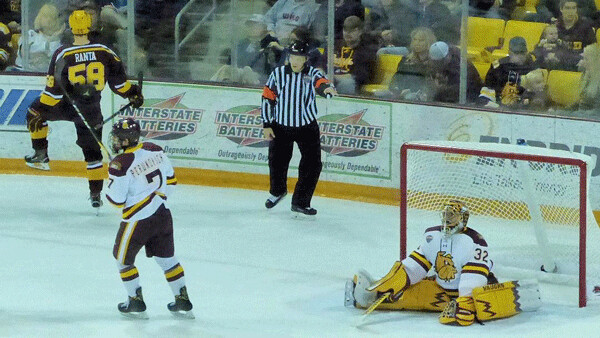 Sampo Ranta, a Gopher freshman from Finland, peeled off to the left after scoring on Hunter Shepard for a 1-0 lead in the 1-1 tie. Photo credit: John Gilbert