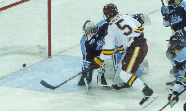 Goaltender Maddie Rooney stopped Abby Halluska at the crease, as Jalynn Elmes helped defend. Photo credit; John Gilbert