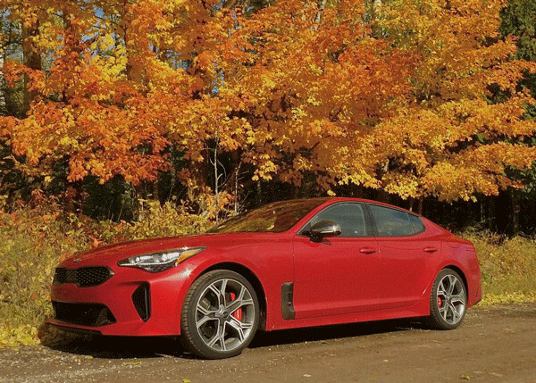 Even the brightest foliage of autumn had nothing on the brilliant Hichroma Red of the 2018 Kia Stinger. Photo credit: John Gilbert