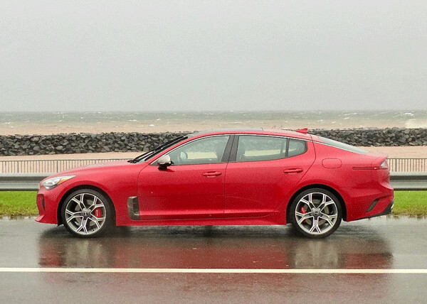  The Kia Stinger strikes an aggressive, sporty silhouette against the early dose of the Gales of November in October. Photo credit: John Gilbert