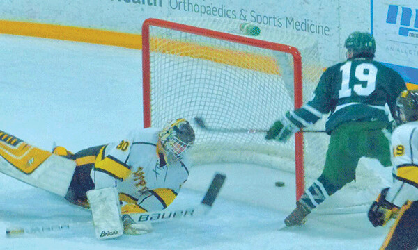 Mounds View’s Henry Claridge (19) scored a power-play goal, and his hat trick led a 4-goal third-period rally to lift subdue Marshall 6-3. Photo credit: John Gilbert