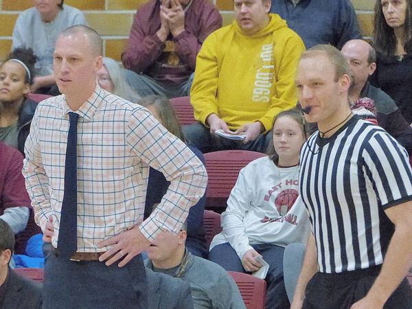 UMD's first-year coach Justin Wieck held his tongue after his questioning of a "flagrant foul" led to a technical late in the game. Photo credit: John Gilbert