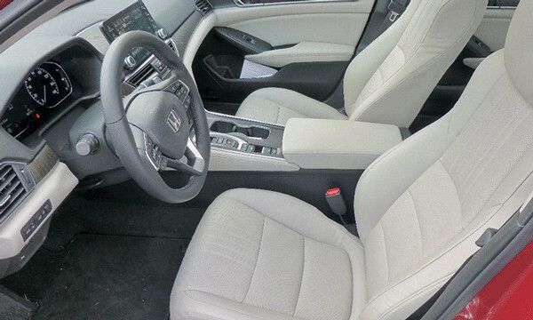 Interior of the $35,000 Accord Hybrid is inviting leather and tasteful dashboard trim. Photo credit: John Gilbert