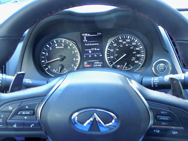 Looking at the Q50 instruments, also note the aluminum paddles on either side to manually shift the 7-speed. Photo credit: John Gilbert