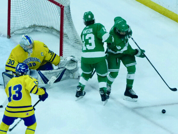 St. Cloud Cathedral goaltender Noah Amundson made a key save on Greenway's Donte Lawson in the Class A final. Photo credit: John Gilbert