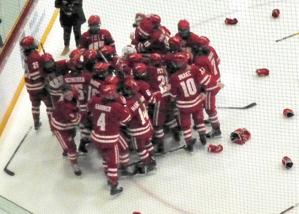 The Badgers celebrated not only winning the WCHA playoff title, but a return to the No. 1 rank for the NCAA pairings this weekend. Photo credit: John Gilbert