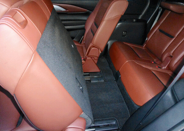 With rear seat folded forward and wide door, access to third row is easier.  Photo credit: John Gilbert