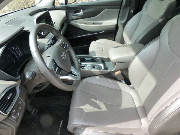 nviting interior of the Santa Fe is filled with fine-fitting leather and soft-touch  fabrics. Photo credit: John Gilbert