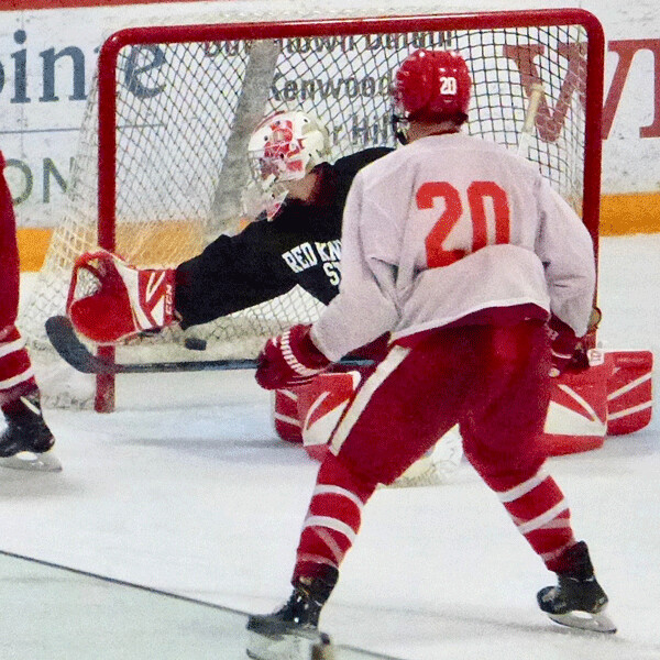 St. Cloud's August Falloon (20) scored two goals and two assists to lead his team from a 3-1 deficit in the second period to a 7-3 victory over Benilde in the Lakeview Classic championship game Sunday. Photo credit: John Gilbert