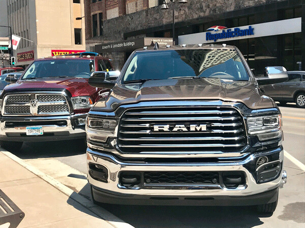 Rams and continued former model, left, are selling at a 28-percent increase this year and have passed Chevy's Silverado (-12-percent) to take second place to F-Series. Photo credit: John Gilbert