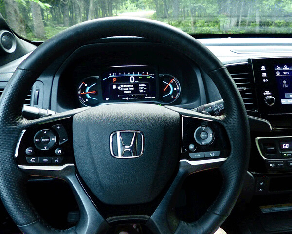 Instrumentation through the steering wheel is efficiently laid out. Photo credit:  John Gilbert