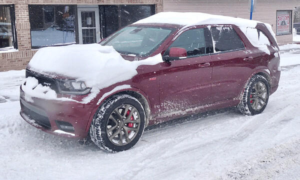 The snow was too heavy to blow completely off the Durango SRT. Photo credit: John Gilbert