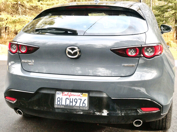 The blunt rear of the hatchback Mazda3 houses extra room and a different silhouette. Photo credit: John Gilbert
