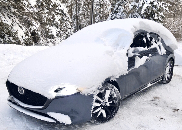 Partially shoveled out, the Mazda3 showed signs of life. Photo credit: John Gilbert