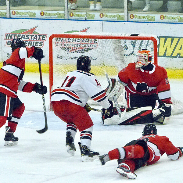 Duluth East's Jack Fellman (11) converted a goal-mouth pass to boost the Greyhounds to a 3-0 lead in an eventual 5-1 victory over heavily favored Lakeville North for East's fourth straight victory. Photo credit: John Gilbert