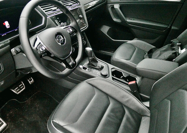 The SEL model Tiguan offers smooth leather bucket seats and an upscale interior. Photo credit: John Gilbert