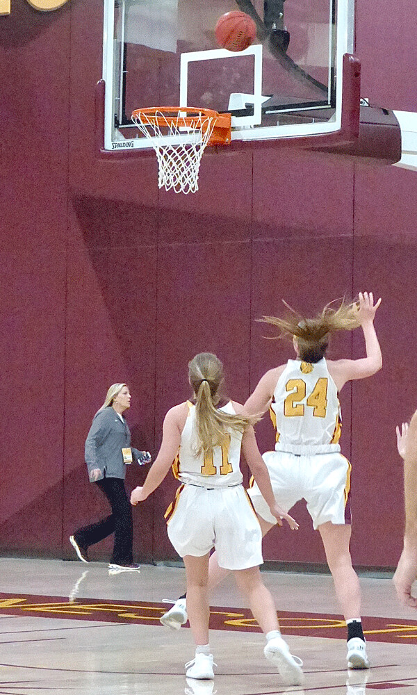  Hair flying, UMD sophomore Brooke Olson watched her shot for two of her 28 points to lead the 11-1 Bulldogs past MSU Mankato Friday at Romano Gym. Photo credit: John Gilbert