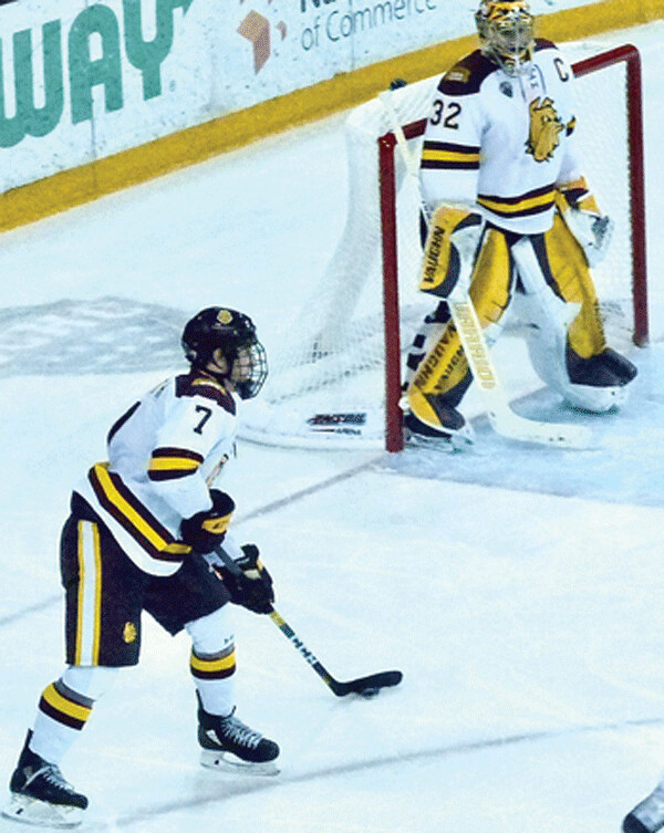 UMD defenseman Scott Perunovich set up shop next to goalie Hunter Shepard, before stepping up to deliver a pinpoint pass. Perunovich, who led the NCHC in scoring, is a favorite for the Hobey Baker Award, which will be issued Friday.