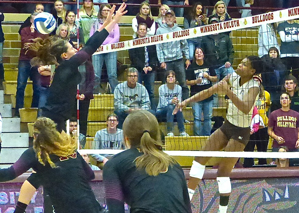 Southwest State star Eisha Oden pounded one of her 12 kills against UMD. Photo credit: John Gilbert