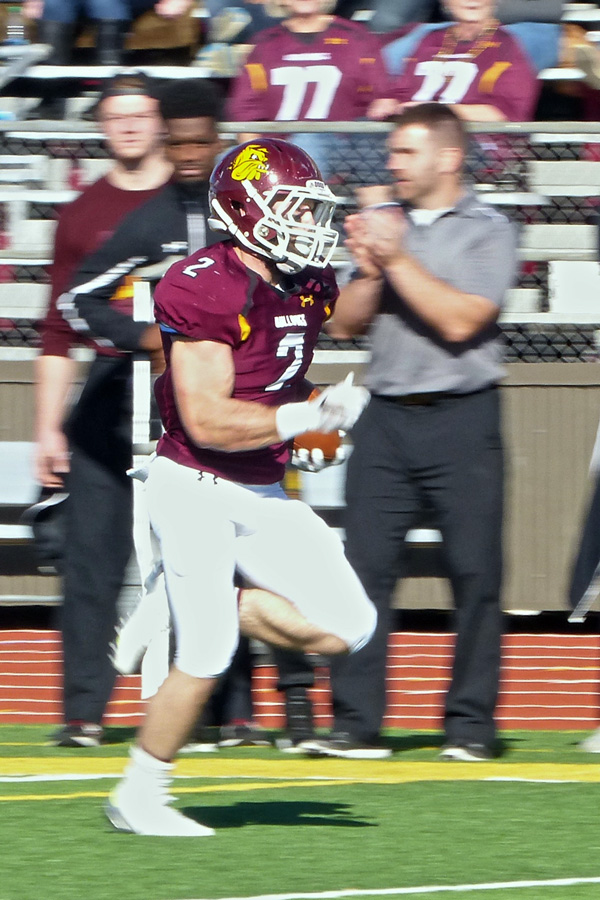 Beau Bofferding, a senior on Senior Day, raced 78 yards in the first quarter for his second touchdown – and 11th in three games -- to ignite a 75-14 romp for UMD over the University of Mary. Photo credit: John Gilber