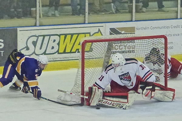 Meierhoff got to the near post in time to block Johnson's shot, and he held on for a 5-0 shutout at Heritage Center. Photo credit: John Gilbert
