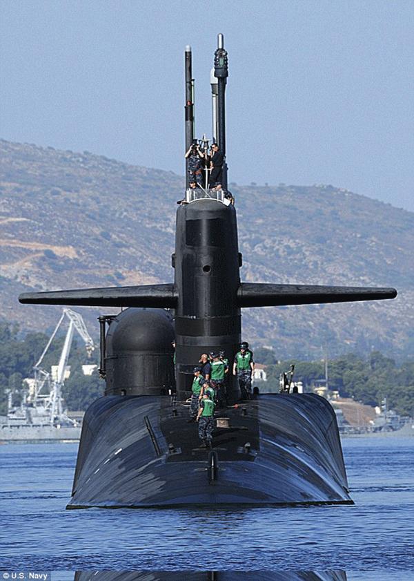 Part of the $2 billion, 18,000-ton, 560-foot-long Trident submarine USS Georgia, powered by two nuclear reactors. The sub was rammed into a channel buoy and run aground near Kings Bay, Ga. last November.